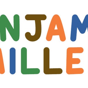 May include: A colorful name sign with the text "BENJAMIN MILLER" in a playful, hand-drawn style. The letters are in various colors, including orange, blue, green, and brown.