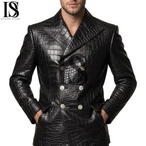 May include: A black double-breasted jacket featuring a textured crocodile skin pattern. The garment has wide lapels, long sleeves, and two side pockets. The front is secured with six silver-toned buttons. The logo IS DYSTRA STORE is visible.