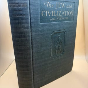 May include: A vintage book titled "The Jew and Civilization" by Ada Sterling. The cover is a muted teal colour with gold lettering. The book has a textured appearance and a decorative emblem.