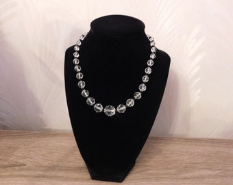 Graduated Clear Beaded Necklace With Black Spacer Beads