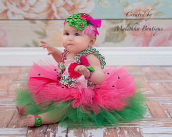 Watermelon Party Cake Smash Outfit, Baby Girl Layered Tutu, Ruffled Satin Romper, Fabric Flower Headband, Pearl Bracelet, Feathers, bright