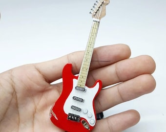 Guitarra roja en miniatura a escala 1:12, coleccionable musical hecho a mano