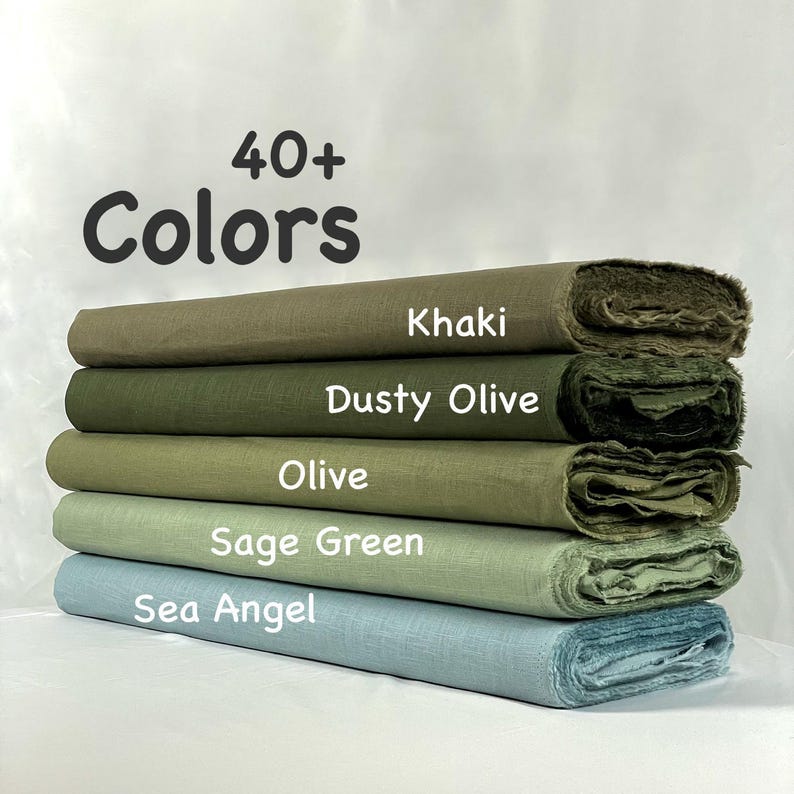 May include: A stack of five folded fabric bolts in shades of khaki, dusty olive, olive, sage green, and sea angel. The text 40+ Colors is displayed above the fabric, with individual color names labeled next to each corresponding fabric roll.