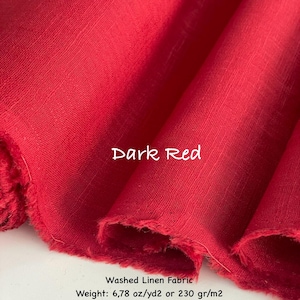 May include: A bolt of dark red washed linen fabric with a visible weave texture. The text on the fabric reads: Dark Red, Washed Linen Fabric, Weight: 6.78 oz/yd2, Width: 54 inches. The material is folded, showing raw, frayed edges.