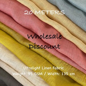 May include: A display of ultralight linen fabric in various colors, including pink, yellow, and gray. The fabric is labeled with the text "20 METERS", "Wholesale Discount", and specifications: Weight: 95 GSM / Width: 135 cm.