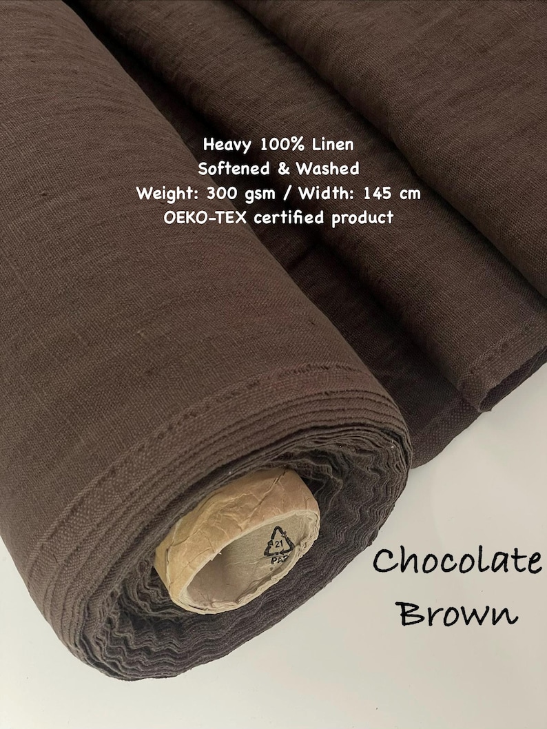 May include: A roll of chocolate brown heavy 100% linen fabric. The fabric is softened and washed, with a weight of 300 gsm and a width of 145 cm. The text "Chocolate Brown" is visible on the image. The product is OEKO-TEX certified.