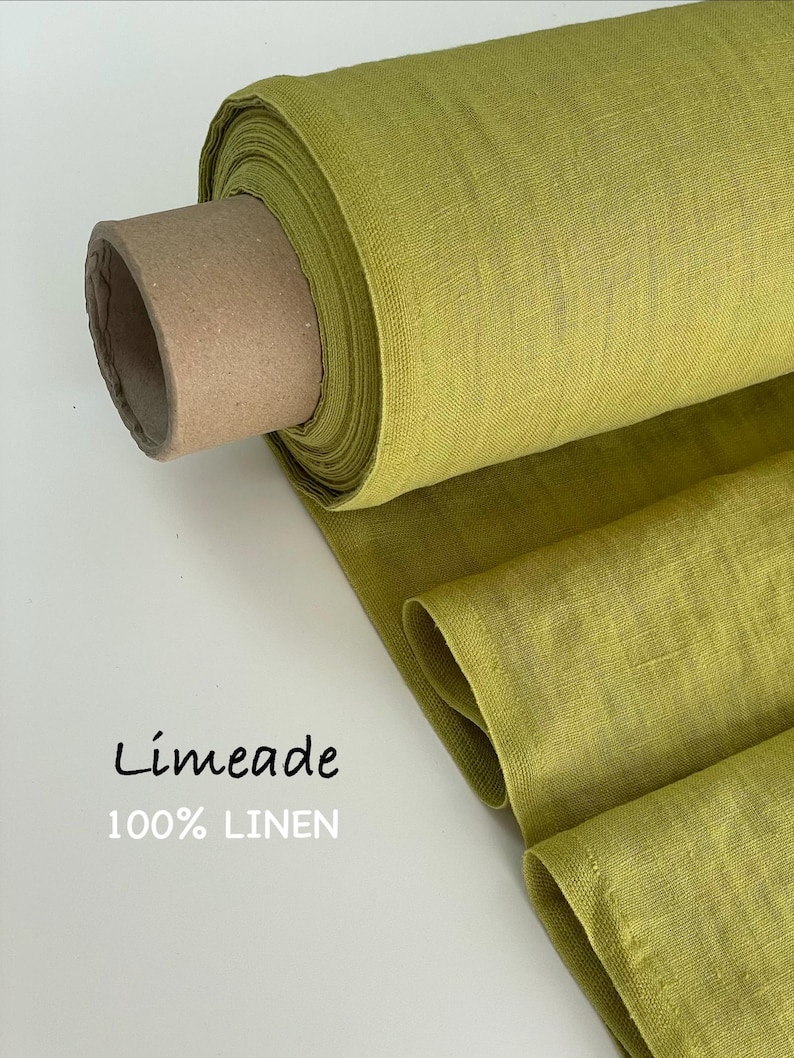May include: A roll of limeade colored fabric made of 100% linen. The textile features a visible woven texture and is wrapped around a cylindrical cardboard core. The text Limeade 100% LINEN is printed in black on the left side of the image.