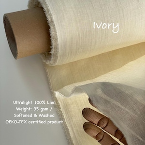 May include: Ivory-colored linen fabric roll. The text on the image reads "Ultralight 100% Lien, Weight: 95 gsm / Softened & Washed, OEKO-TEX certified product". The fabric is a light, natural color, and the roll is partially unraveled, showing the texture.