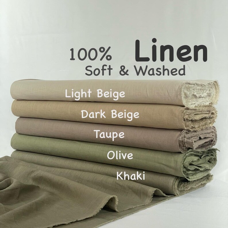 May include: A stack of five fabric bolts labeled 100% Linen Soft & Washed, featuring colors Light Beige, Dark Beige, Taupe, Olive, and Khaki. Each bolt shows a textured, woven surface with frayed edges on the ends, arranged in a vertical pile.