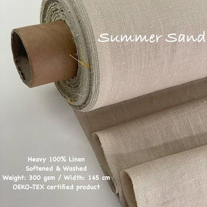 May include: A roll of beige linen fabric labeled "Summer Sand." The fabric is heavy, 100% linen, softened, and washed. The weight is 300 gsm, and the width is 145 cm. The product is OEKO-TEX certified.