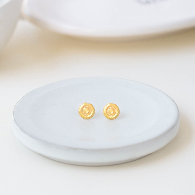 Round gold studs image 1