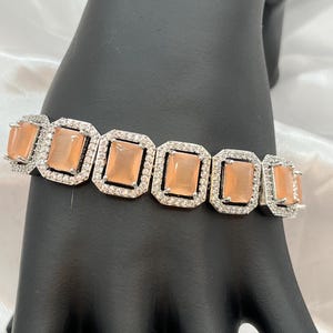 Cubic zirconia silver with peach color glass stone bracelet flexible  good quality