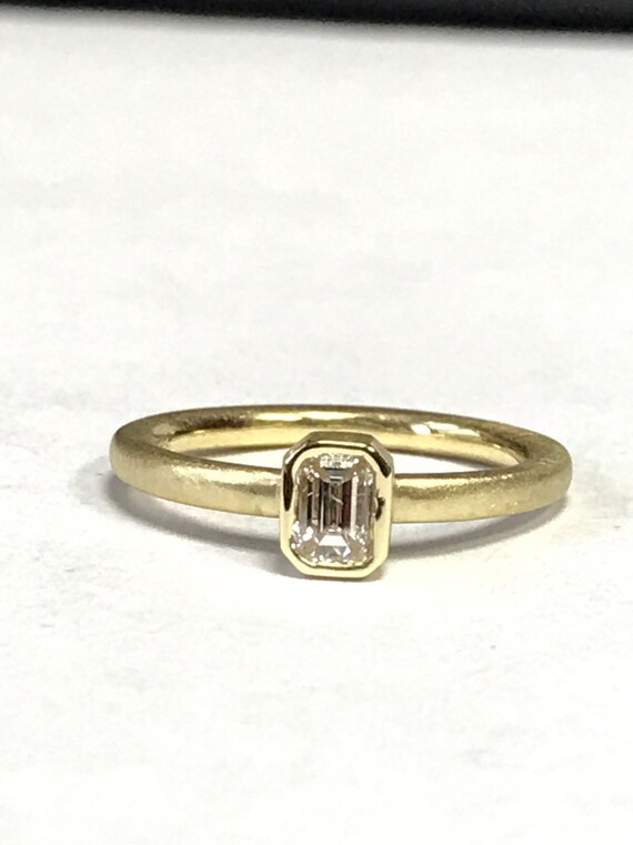 Bezel Set Emerald cut diamond ring 18k yellow gold matte | Etsy