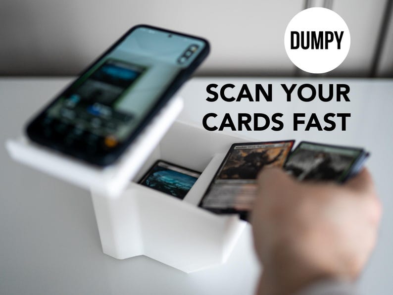 3D-printed white trading card scanner and dispenser tray with a built-in phone stand. Designed for TCG, MTG, Pokémon, and Lorcana, allowing easy card scanning with apps like Manabox, TCGPlayer, and Delver Lens. Perfect for collectors and sellers.