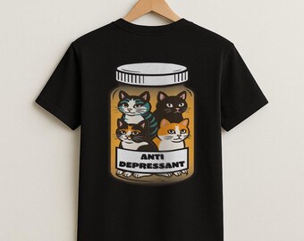 May include: Black t-shirt with a graphic of a glass jar labeled "Anti Depressant" containing four cartoon cats.