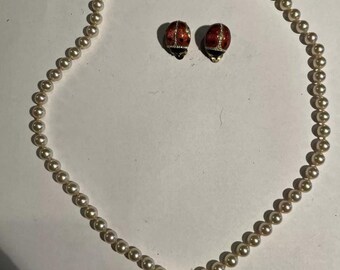 Vintage pair of sterling pearls and Enamel ladybug earrings