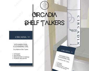 Könnte beinhalten: Eine weiße Flasche Circadia Vitamin Veil Cleansing Oil, 198 ml, mit einem schwarz-weißen Etikett. Das Etikett enthält den Produktnamen, den Hauttyp und die wichtigsten Vorteile. Ein Regalaufsteller mit denselben Informationen ist ebenfalls sichtbar.