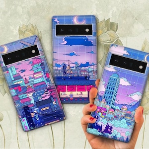 Puede incluir: Tres fundas para teléfono con diseños diferentes. La primera funda tiene un paisaje urbano con un esquema de color rosa y azul. La segunda funda tiene un paisaje urbano con un esquema de color morado y azul. La tercera funda tiene un paisaje urbano con un esquema de color morado y azul y el texto "Shinjuku" en japonés.