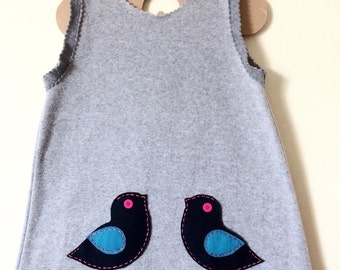 Girl's dress, sleeveless grey fleece with little felt ducky pockets.