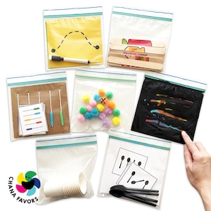 May include: Assortment of clear plastic bags with various activities for kids. The bags contain items like pom poms, a black felt board, a wooden counting activity, a dry erase board with a marker, and a set of spoons.