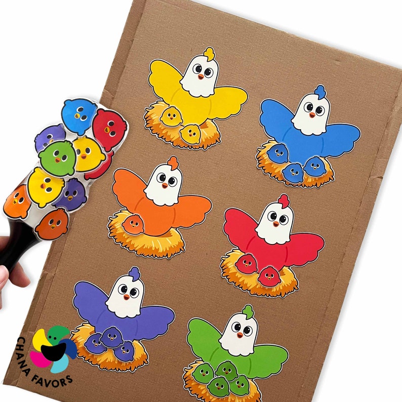 May include: A set of colorful felt chick and chickadee cutouts with a brown background. Each chick has a different color and is surrounded by smaller chicks of the same color.
