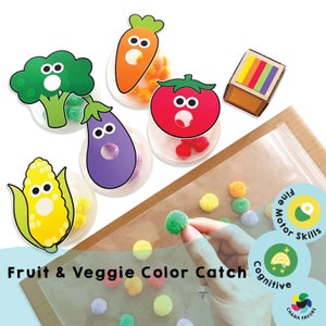 Peut inclure: Un jeu de capture de couleurs de fruits et légumes avec des pompons colorés. Le jeu comprend une carotte, une tomate, une aubergine, un brocoli et du maïs. Le jeu est conçu pour aider les enfants à apprendre les couleurs et à développer leur motricité fine.