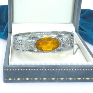 1920s Art Deco Sterling Silver Filigree Bangle Bracelet with Orange Topaz Glass Stone, Rhodium Plated Antique Jewelry