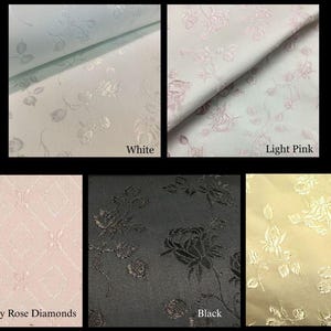 May include: A collection of five fabric swatches featuring floral and geometric patterns. The colors include white, light pink, dusty rose diamonds, black, and pale yellow. Each swatch displays a textured, woven design with rose motifs.