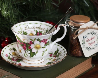 Floral December Vintage Teacup and Saucer Set with Holiday Spice Tea