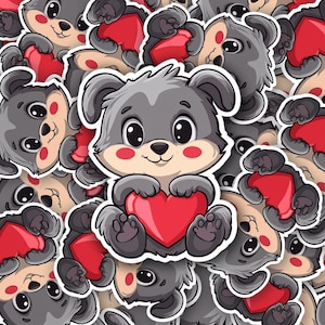 Adorable chiot tenant un autocollant coeur Saint-Valentin - Joli cadeau de Saint-Valentin, parfait pour les ordinateurs portables, les bouteilles d'eau et les journaux, autocollant d'amour