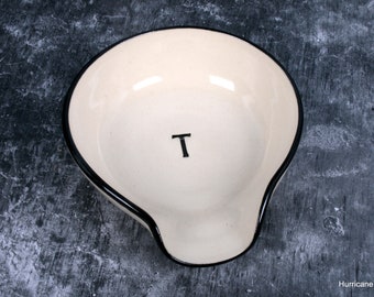 Initial T. White Ceramic Spoon Rest with black trim.  Hand Stamped, Wheel Thrown Ceramic Pottery. Kitchen Dish for Spoons.