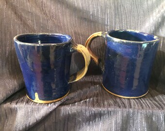 two blue mugs