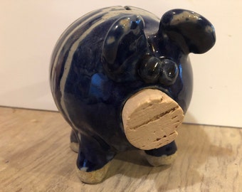 Blue and white striped pig bank