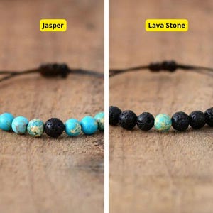 May include: Two close-up images of beaded bracelets. The first bracelet features blue jasper beads and black lava stone beads. The second bracelet features all black lava stone beads. Both bracelets have black string.