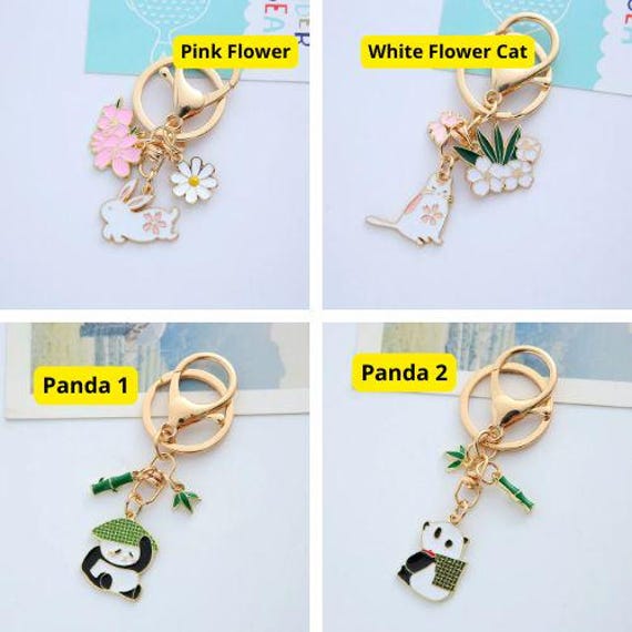 デイジーチャーム付きピンクの花柄ウサギキーチェーン - ボヘミアン