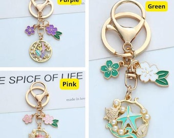 Purple Floral Keychain with Pearls - Elegant Gold Charm for Bags or Keys, Perfect Gift for Women, Trendy Travel Accessory