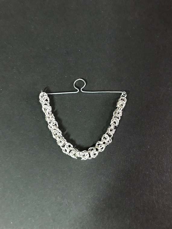 Silver store tie chain