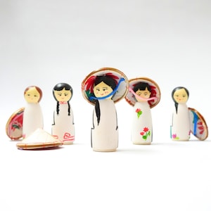 Set of five wooden Vietnamese traditional Ao Dai peg dolls with conical hat