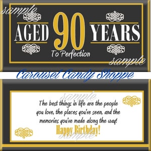 May include: A black and gold chocolate bar wrapper with the text "AGED 90 YEARS To Perfection" and a message that reads "The best things in life are the people you love, the places you've seen, and the memories you've made along the way. Happy Birthday!"