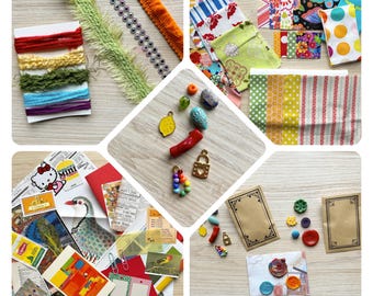 May include: A collage of craft supplies including colorful yarn, ribbons, fabric scraps, and decorative charms. The items are arranged on a light wood surface, showcasing a variety of textures and patterns, perfect for crafting projects.