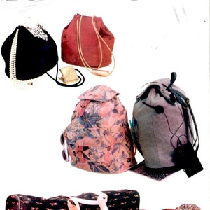 May include: Butterick pattern 5137 featuring various bag designs. Includes a black drawstring bag, a red drawstring bag, a floral backpack, a gray backpack, a black duffel bag with a bow pattern, and a floral duffel bag.