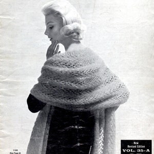 May include: Vintage black and white image of a woman wearing a knitted shawl. The image is from a pattern book with the words "STOLES CAPES SHORTIES" at the top. The book cover also includes the text "TO KNIT OR CROCHET WITH BEAR BRAND and FLEISHER YARNS."