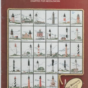 May include: A needlework chart titled "Lighthouses of the East Coast." The chart features a grid of 24 lighthouse designs, each in a small square. The title is in large white letters at the top, with a rope border.