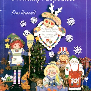 May include: A collection of painted wooden holiday figures, including a reindeer, a scarecrow, a Santa Claus, a pig, and a witch. The figures are all decorated with festive colors and details, and they are arranged on a blue background with snowflakes.