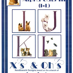 May include: A cross-stitch pattern featuring the letters I, J, K, and L, each adorned with embroidered cats. The design includes the text "Alpha Cats III (I-L)" and "X's & Oh's Needlework Designs" by Joanne Gatenby.