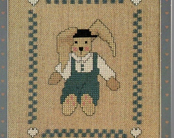 Mr. March Hare Bunny Rabbit in Plain Clothes Black Hat White Shirt Blue Pants Cross Stitch Craft Pattern Card