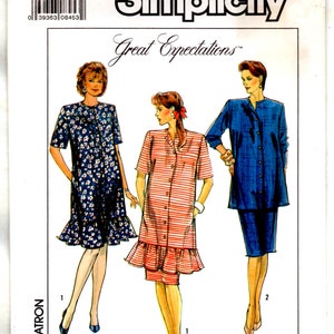 May include: A Simplicity sewing pattern envelope 9030 for size 14, featuring illustrations of three outfits: a floral print dress with a ruffled hem, a striped dress with a ruffled hem, and a solid blue long-sleeve jacket with a matching skirt.