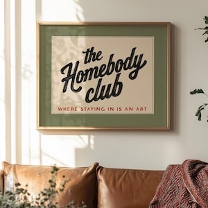 Cozy quote print for introverts featuring “The Homebody Club” in decorative typography.