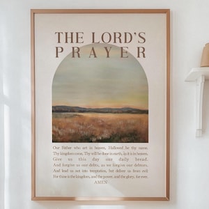 May include: A printable wall art print with a beige background and a brown archway. The text "THE LORD'S PRAYER" is in brown text at the top of the print. The text of the Lord's Prayer is printed in brown text below the archway. The background of the archway is a painting of a field with a sunset in the background.