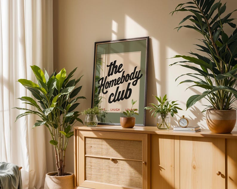 Cozy wall art featuring “Live Laugh Lounge” quote